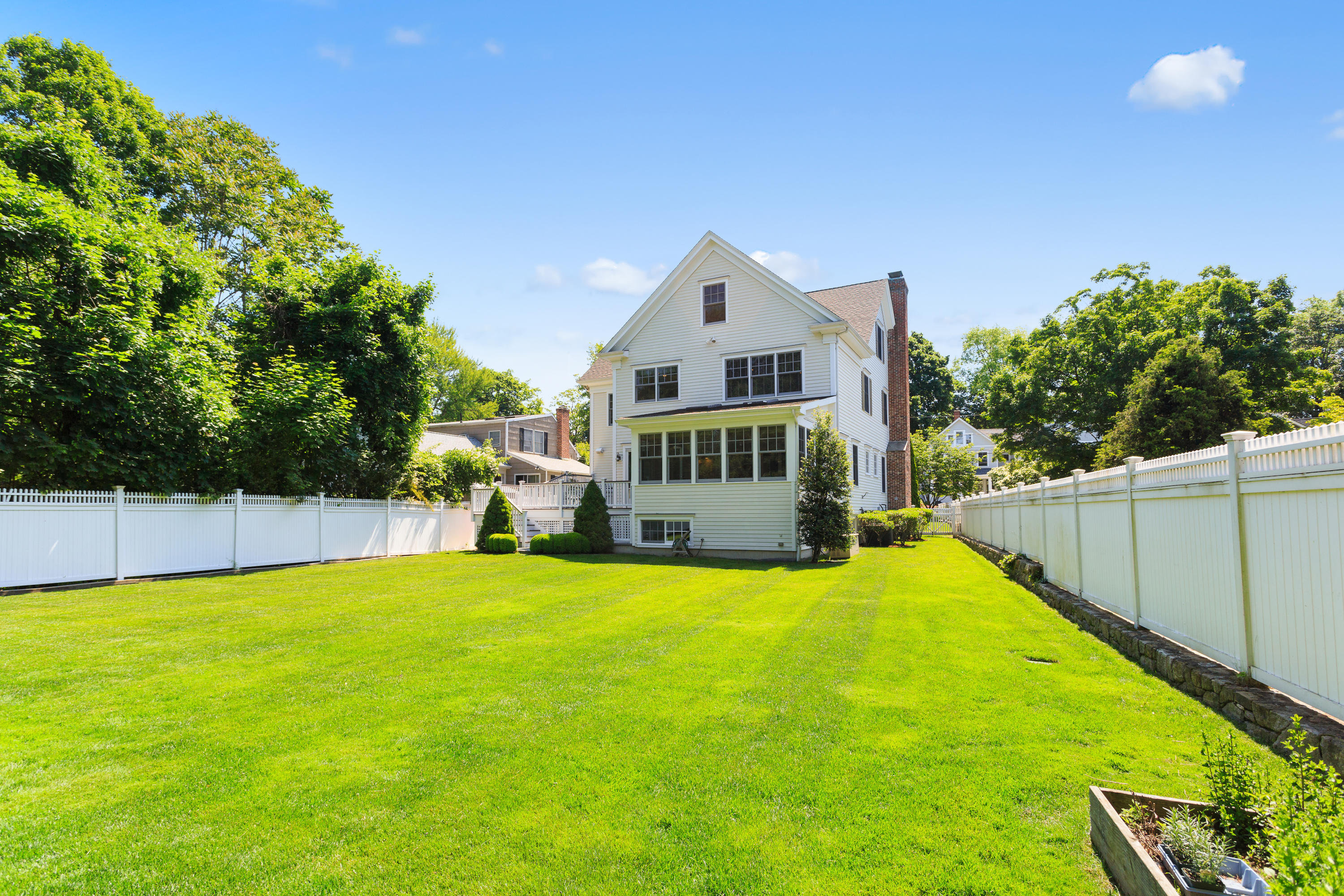 11 Harstrom Place Rowayton, CT 06853 - Photo 21 of 22 a view of a house with swimming pool and yard