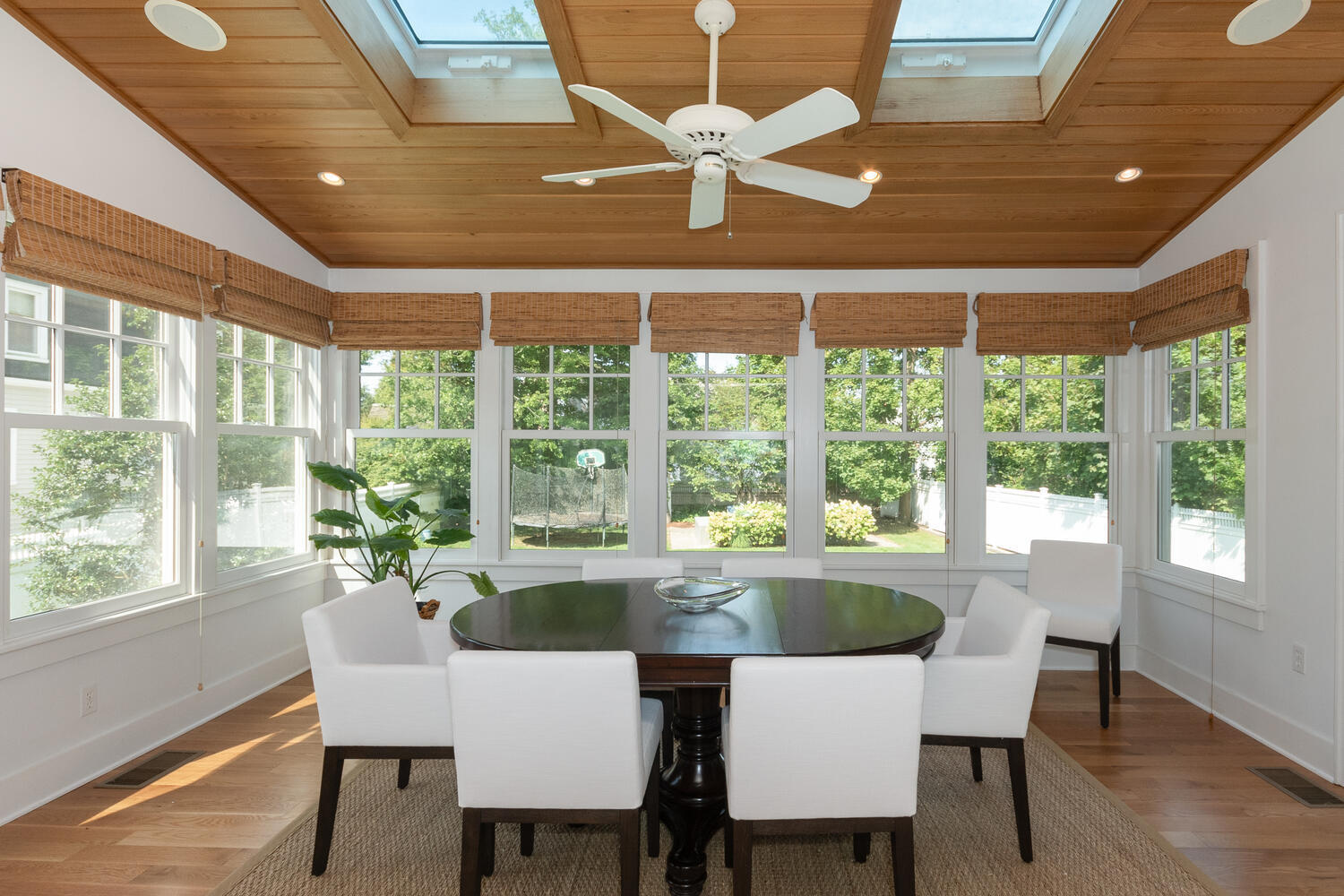 11 Harstrom Place Rowayton, CT 06853 - Photo 5 of 22 a view of a dining room with furniture large windows and wooden floor