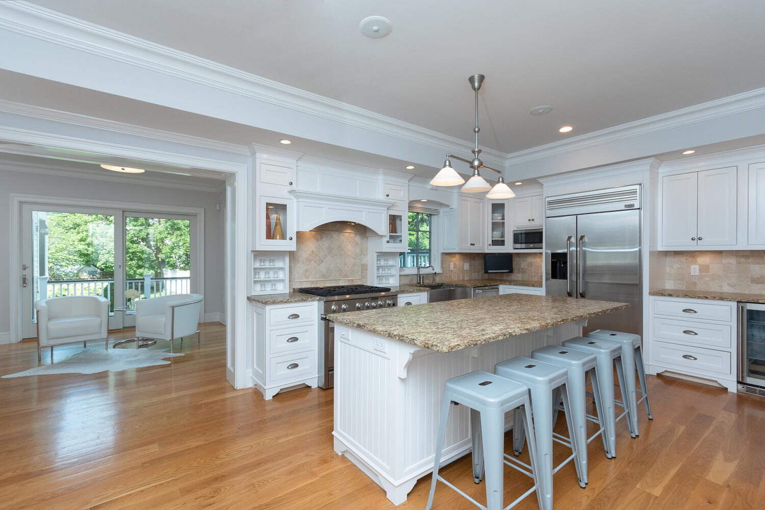 11 Harstrom Place Rowayton, CT 06853 - Photo 8 of 22 a kitchen with white cabinets and sink