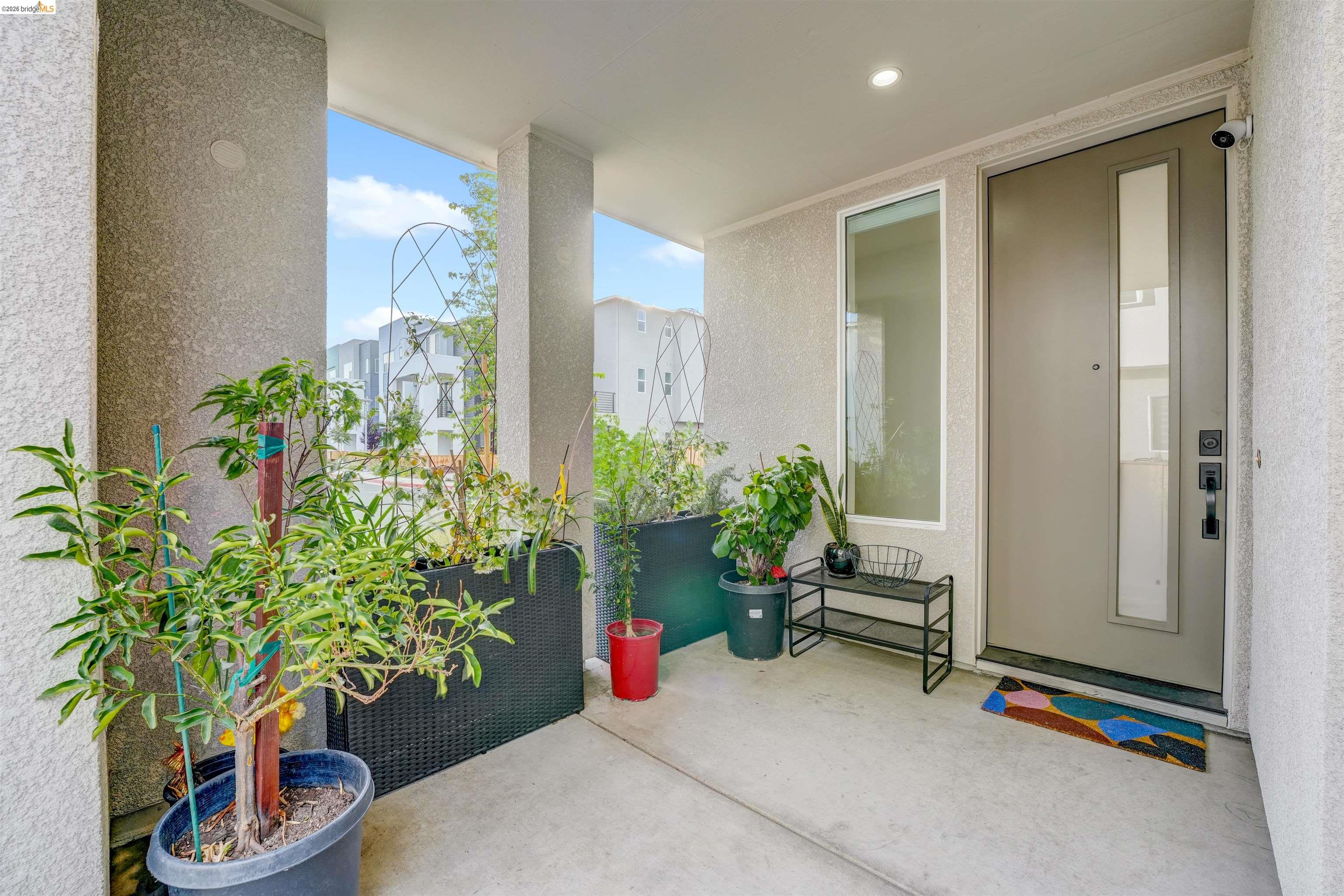 7101 Melon Court San Ramon, CA 94583 - Photo 4 of 58 a living room with furniture and flowers