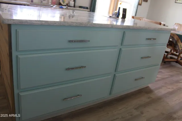 a bathroom with a sink a vanity and a mirror