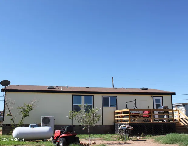 a view of a town with mountains in the background