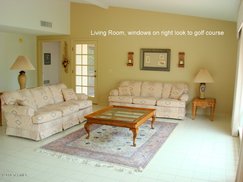 9985 North Desert Sky Road Oro Valley, AZ 85737 - Photo 9 of 43 a living room with furniture and a painting