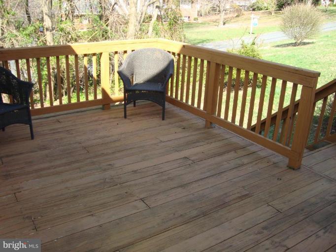 10 Trumpet Court Nottingham, MD 21236 - Photo 14 of 17 a view of deck with furniture and wooden floor