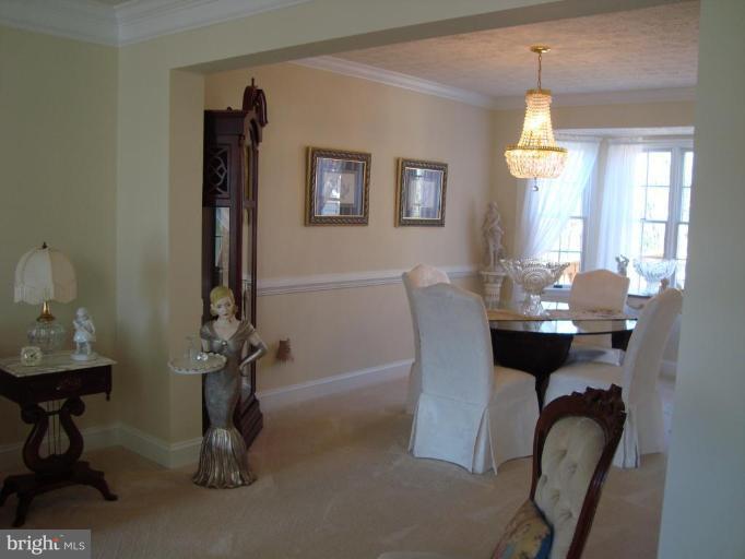 10 Trumpet Court Nottingham, MD 21236 - Photo 5 of 17 a dining room with furniture and window
