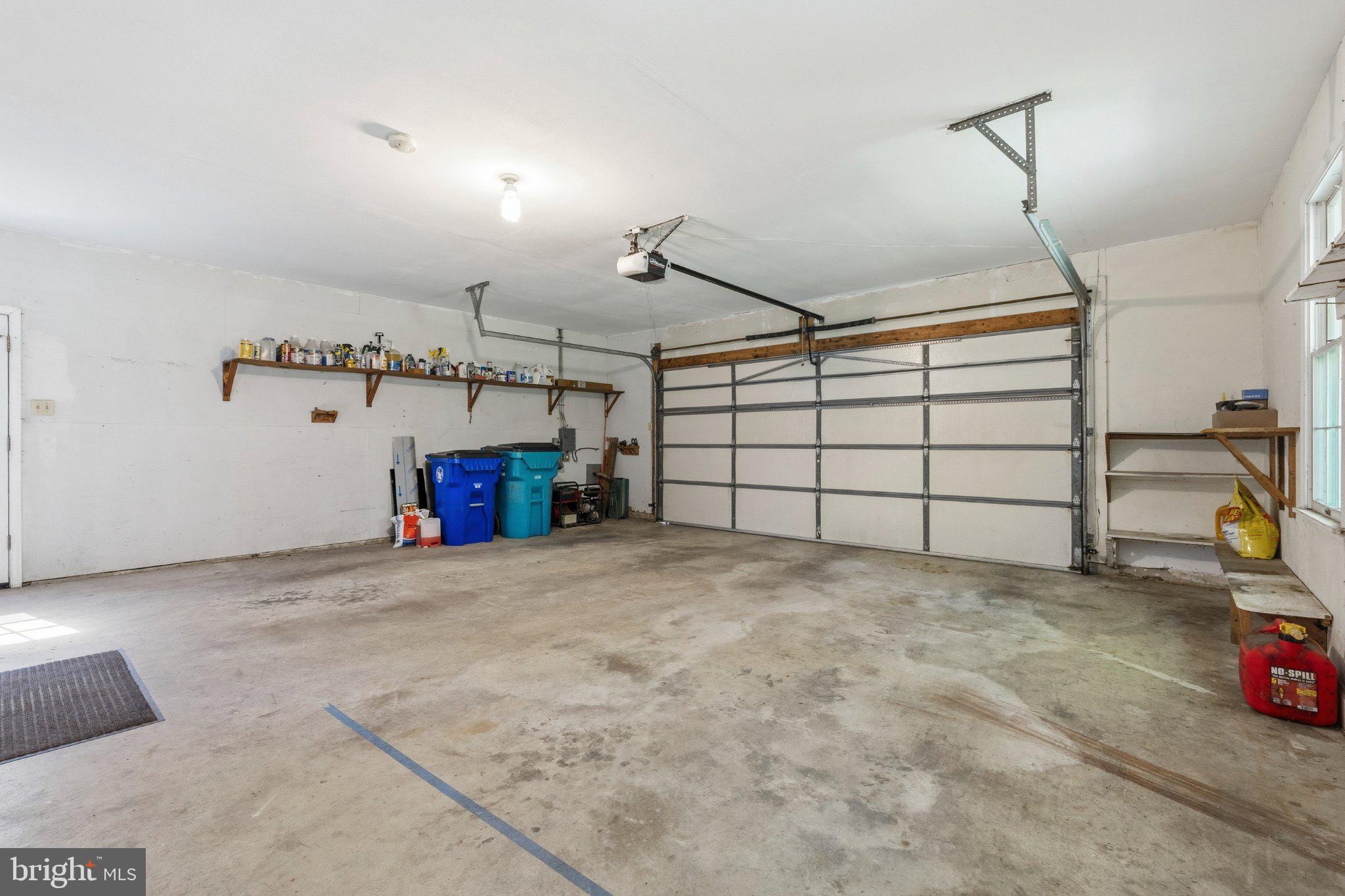 10820 Gambrill Park Road Frederick, MD 21702 - Photo 23 of 36 Spacious garage with ample storage.