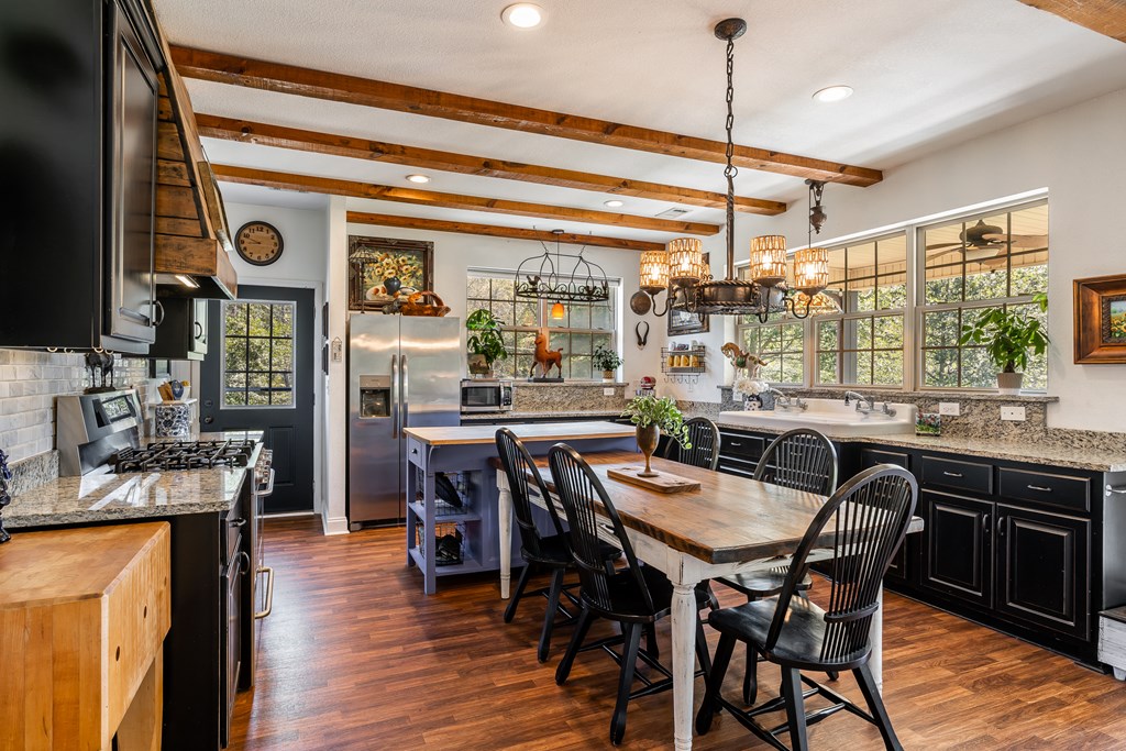 1681 Marrestop Road Murphy, NC 28906 - Photo 11 of 53 a dining table with chairs and window
