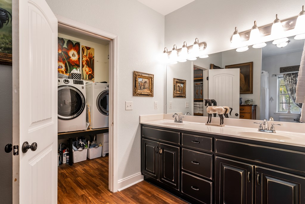1681 Marrestop Road Murphy, NC 28906 - Photo 18 of 53 a bathroom with a double vanity sink and a mirror
