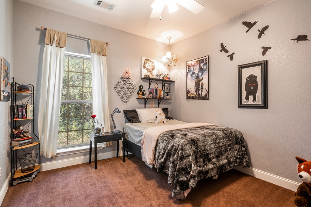 1681 Marrestop Road Murphy, NC 28906 - Photo 27 of 53 a bedroom with a bed and a window