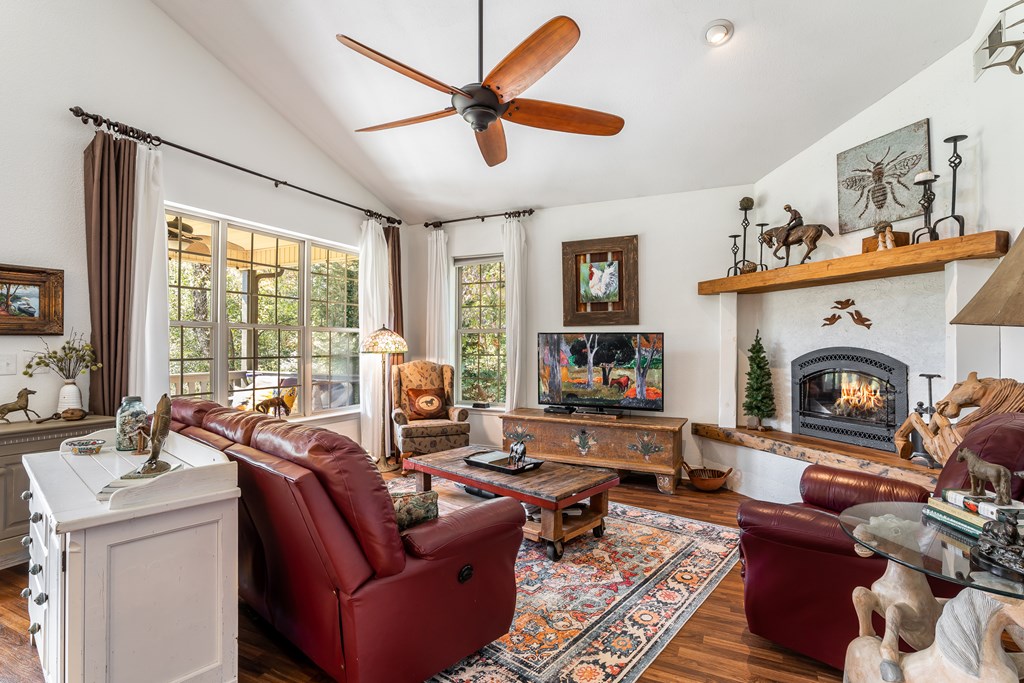 1681 Marrestop Road Murphy, NC 28906 - Photo 5 of 53 a living room with furniture a large window and a fireplace