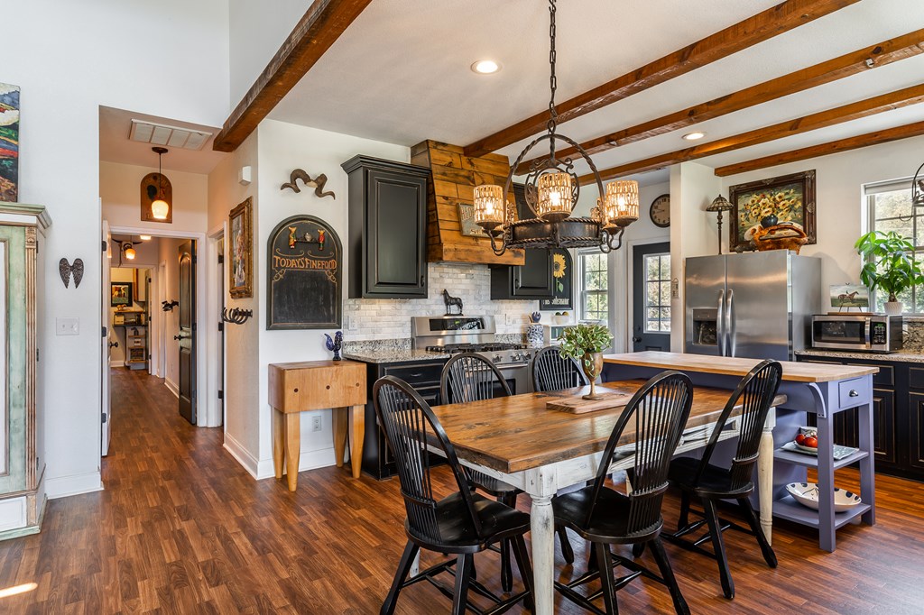 1681 Marrestop Road Murphy, NC 28906 - Photo 9 of 53 a view of a dining room with furniture and wooden floor