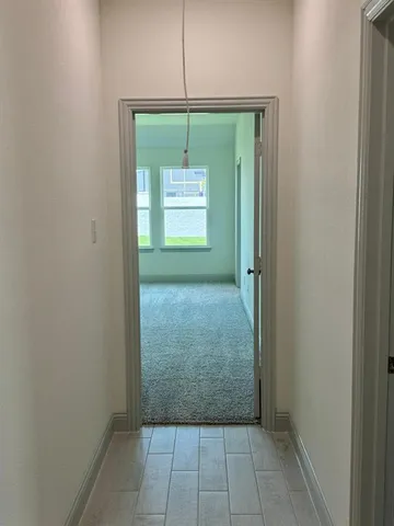 a view of a room that has a window