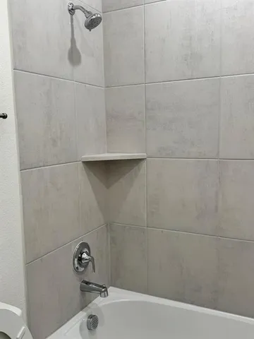 a bathroom with a bathtub