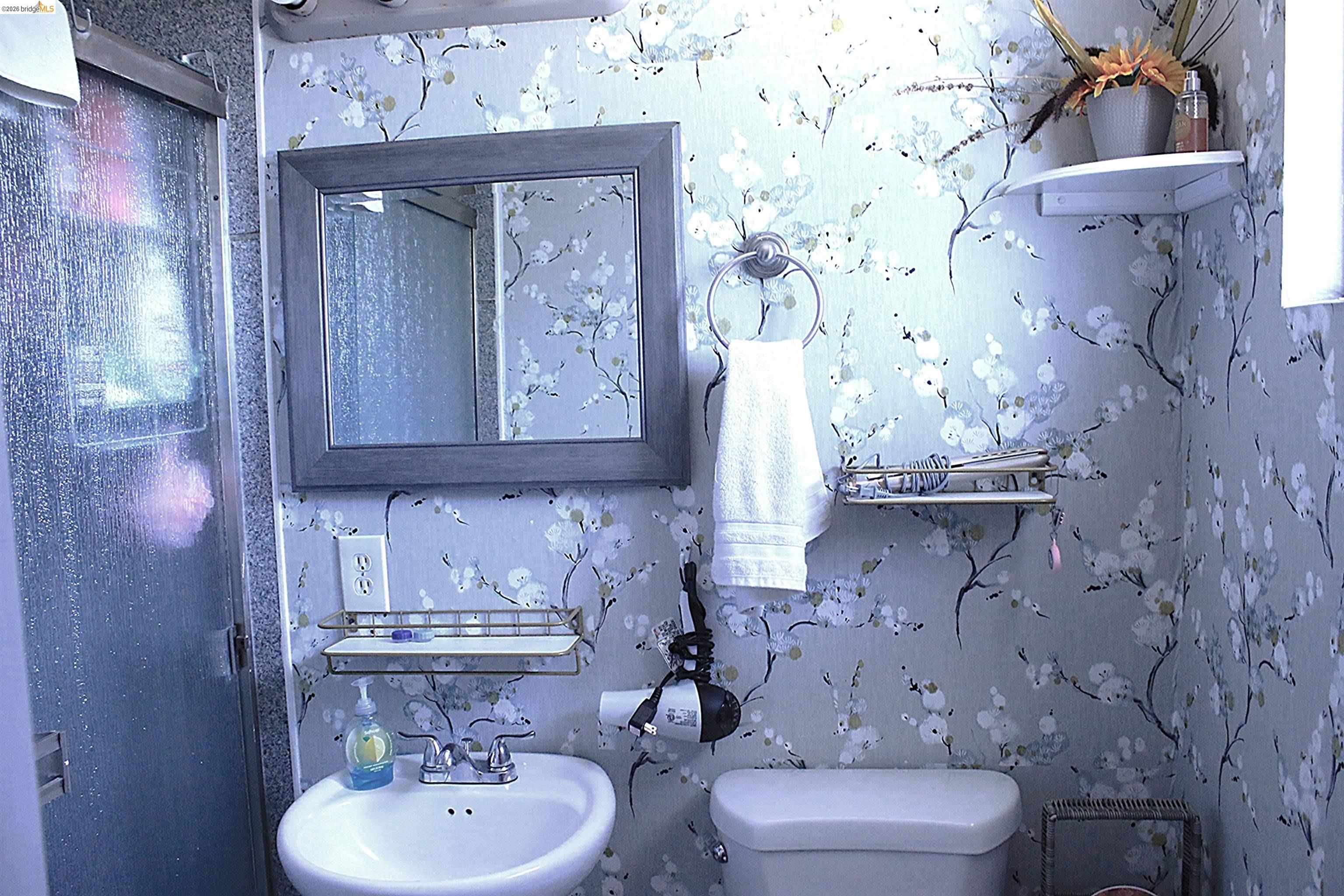 190 Tahoe Drive Rio Vista, CA 94571 - Photo 15 of 44 Bathroom with wallpapered walls and toilet