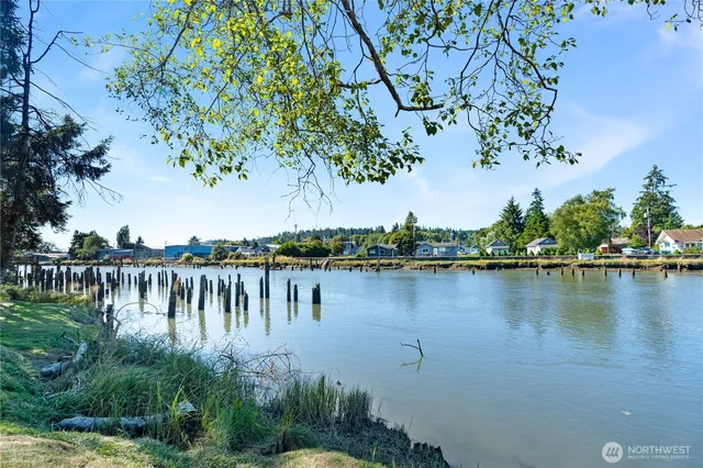 a view of a lake with houses with outdoor space