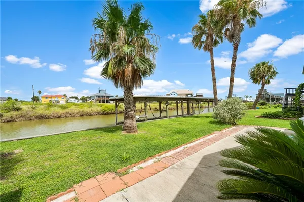 a view of a garden with an ocean