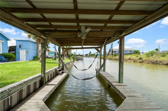 a view of a swimming pool with a porch