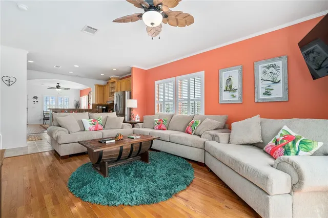a living room with furniture rug and window