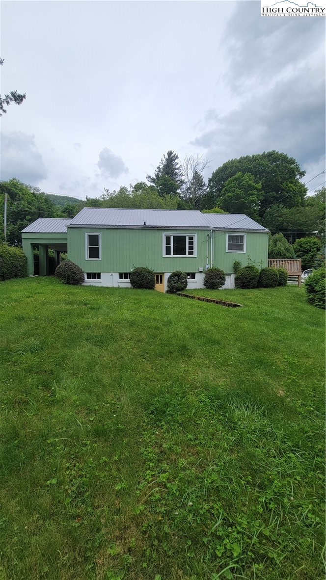 229 Old Bristol Road Boone, NC 28607 - Photo 2 of 6 a front view of house with yard and green space