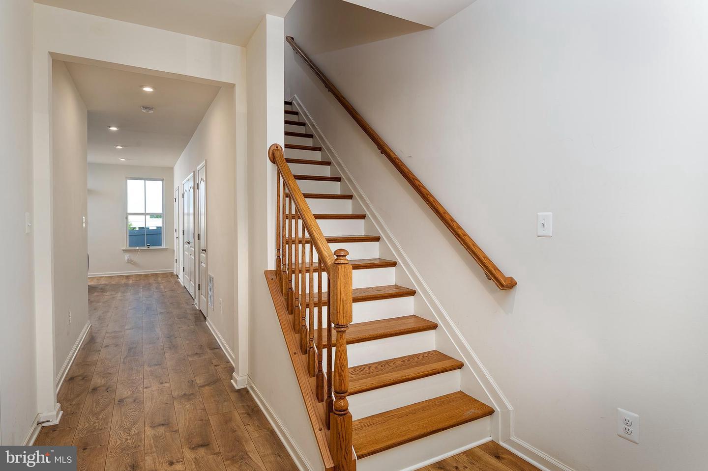 7123 Millstone Road Hanover, MD 21076 - Photo 3 of 13 Inviting entryway with staircase.