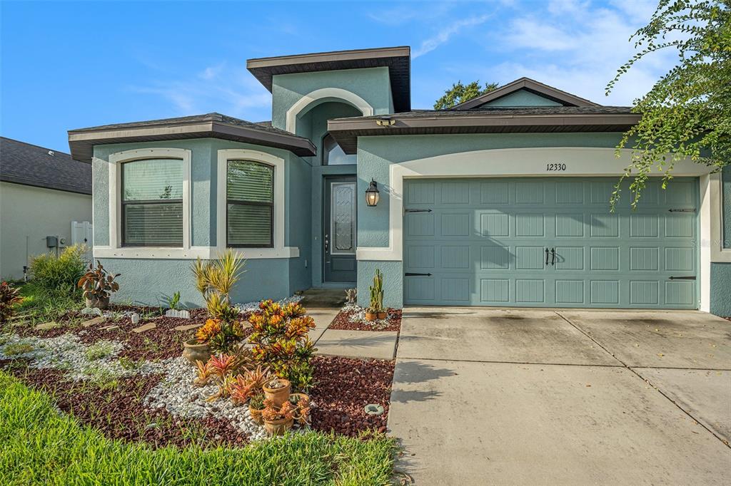 12330 Newt Court New Port Richey, FL 34654 - Photo 4 of 30 front view of a house