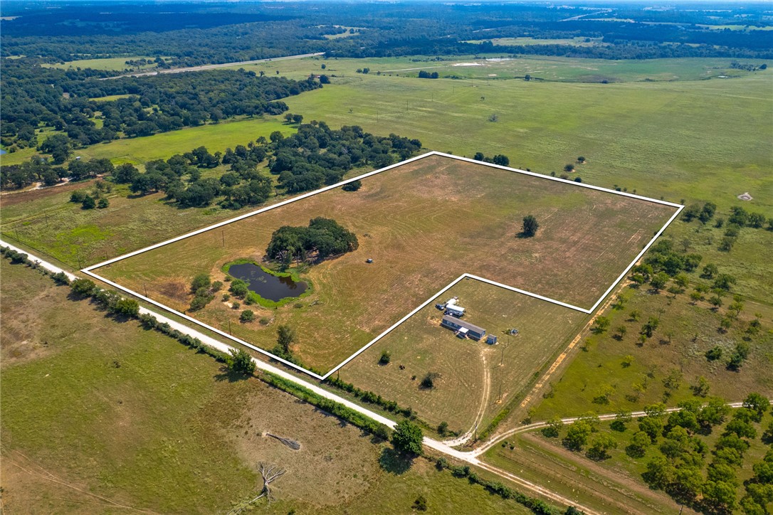 11733 Winstead Lane Calvert, TX 77837 - Photo 8 of 26 Aerial view of sparsely populated area with property boundaries highlighted