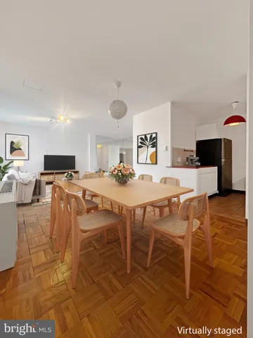 a view of a dining room with furniture