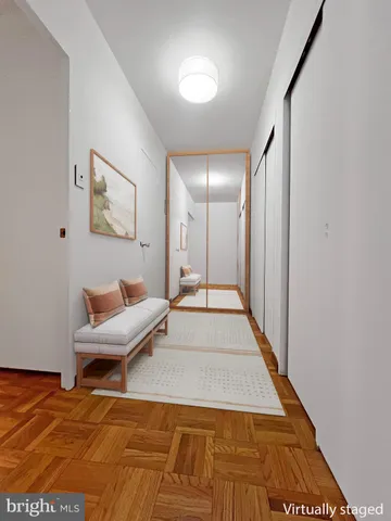 a living room with a bed and furniture