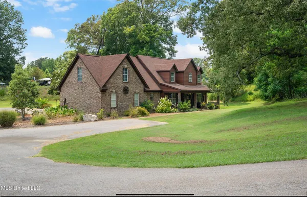 $395,000 | 6193 Nesbit Road, Lake Cormorant, MS 38641