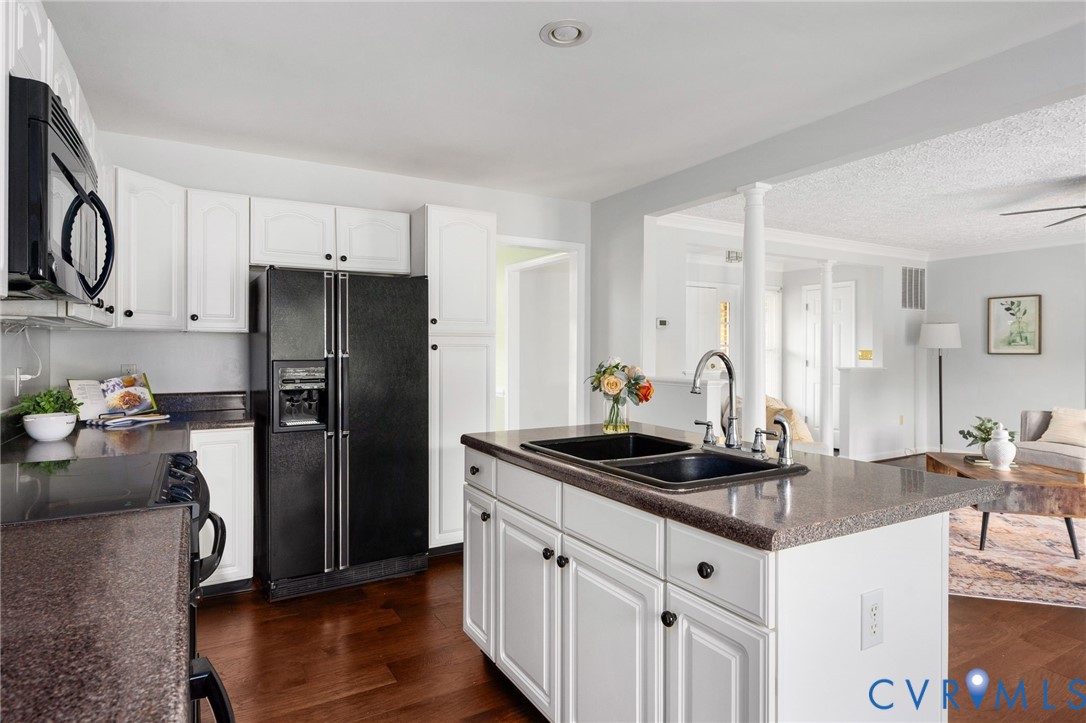 16379 Arch Hill Road Hanover, VA 23069 - Photo 10 of 26 a kitchen with granite countertop a sink stove and refrigerator