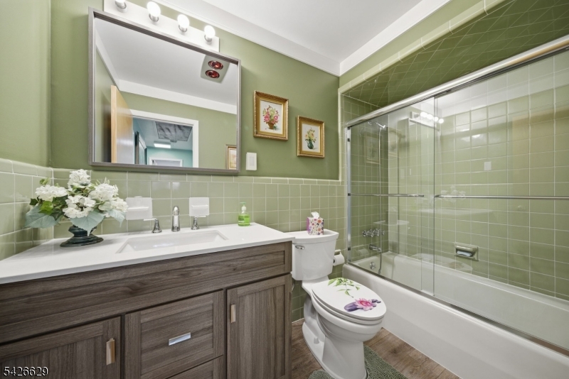 42 Schoolhouse Road Randolph, NJ 07869 - Photo 27 of 49 a bathroom with a sink a toilet and shower