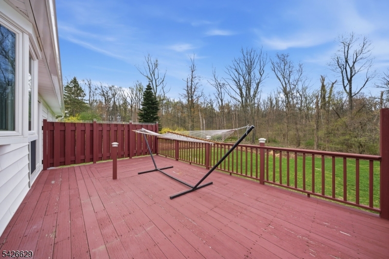 42 Schoolhouse Road Randolph, NJ 07869 - Photo 39 of 49 a view of deck with wooden floor and outdoor seating