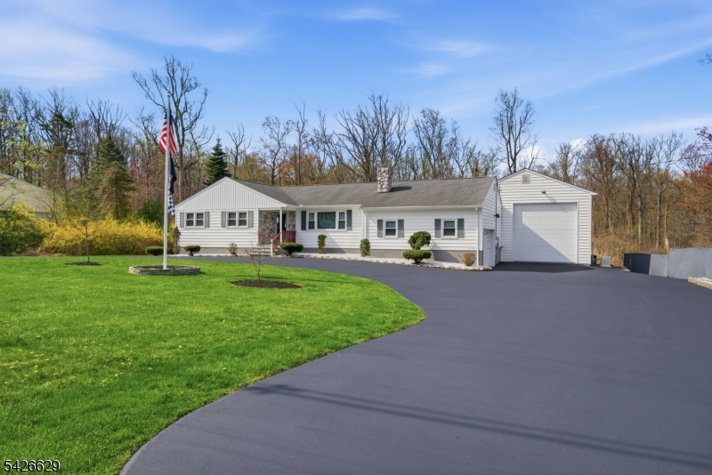 42 Schoolhouse Road Randolph, NJ 07869 - Photo 4 of 49 a view of house with outdoor space and street view