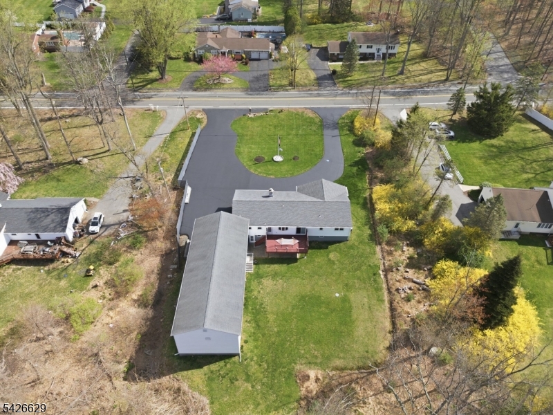 42 Schoolhouse Road Randolph, NJ 07869 - Photo 45 of 49 an aerial view of a house with yard swimming pool and outdoor seating