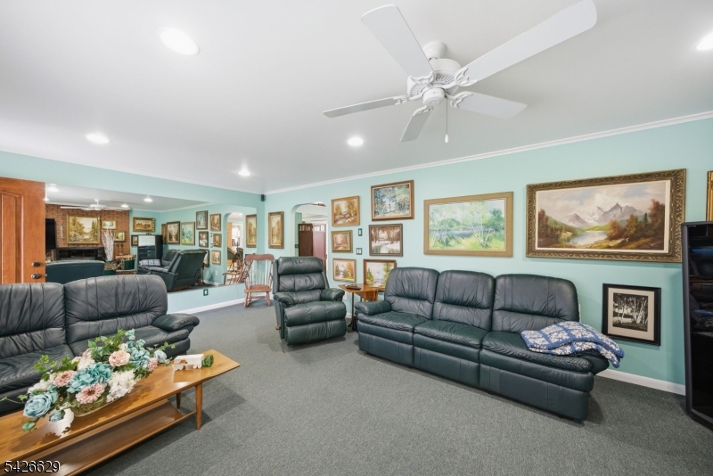 42 Schoolhouse Road Randolph, NJ 07869 - Photo 7 of 49 a living room with furniture and a large window