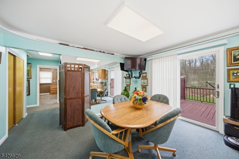 42 Schoolhouse Road Randolph, NJ 07869 - Photo 10 of 49 a view of a dining room with furniture and a livingroom