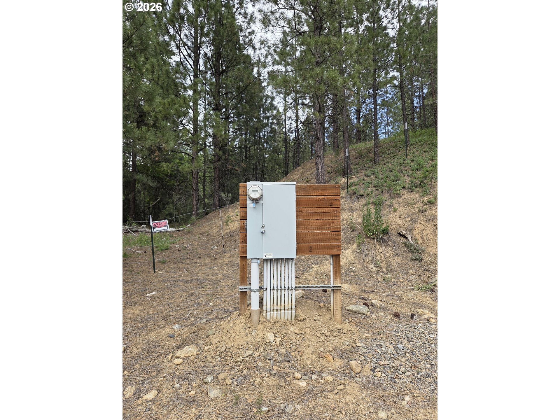 602 Mill Street Sumpter, OR 97877 - Photo 24 of 25 a backyard of a house with table and chairs
