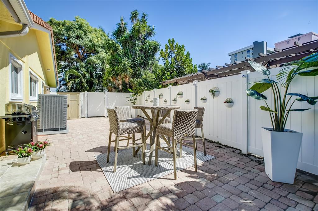 2600 North Riverside Drive Pompano Beach, FL 33062 - Photo 12 of 25 a view of outdoor kitchen with seating area