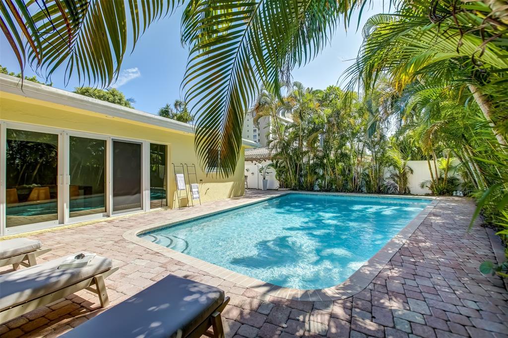 2600 North Riverside Drive Pompano Beach, FL 33062 - Photo 13 of 25 a view of a house with a yard