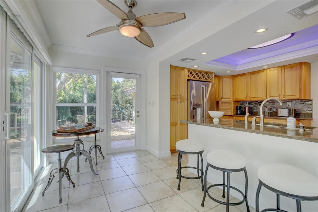 2600 North Riverside Drive Pompano Beach, FL 33062 - Photo 14 of 25 a view of a dining room with furniture window and outside view