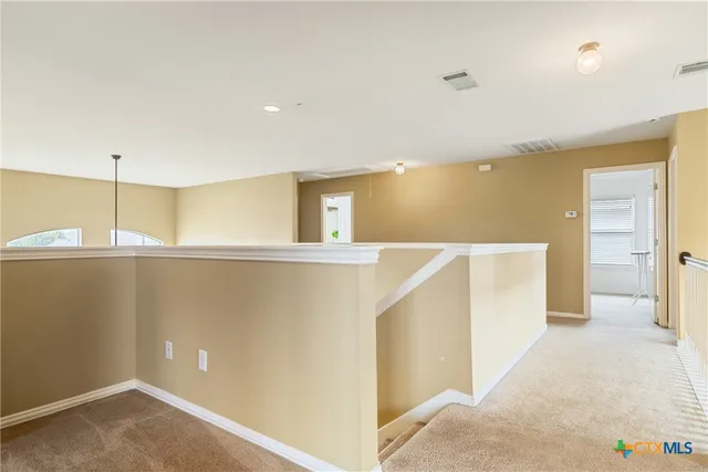 a view of a kitchen with an empty space