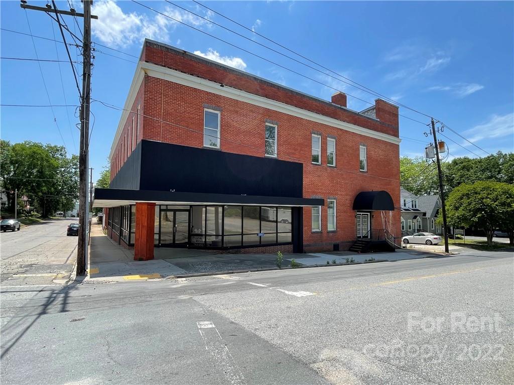 201 West Morgan Street, Unit B Wadesboro, NC 28170 - Photo 2 of 14 a front view of a house with a garden