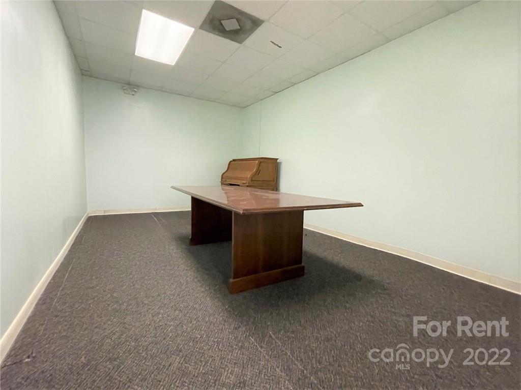 201 West Morgan Street, Unit B Wadesboro, NC 28170 - Photo 6 of 14 a room with a rug