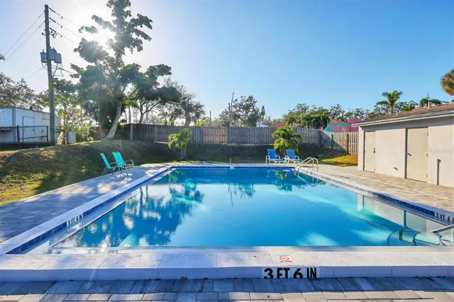 a view of a house with a swimming pool