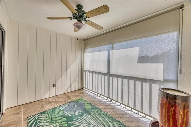 a view of a hallway with a chandelier