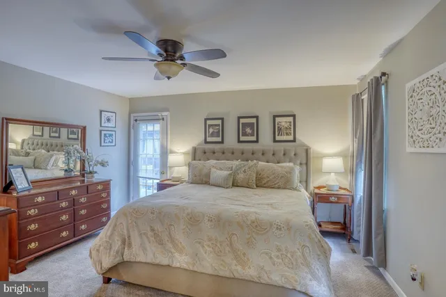 a bed room with a bed and a window