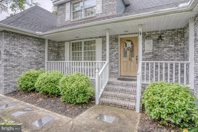 a bedroom with a bed and furniture