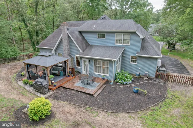 an aerial view of residential house with outdoor space