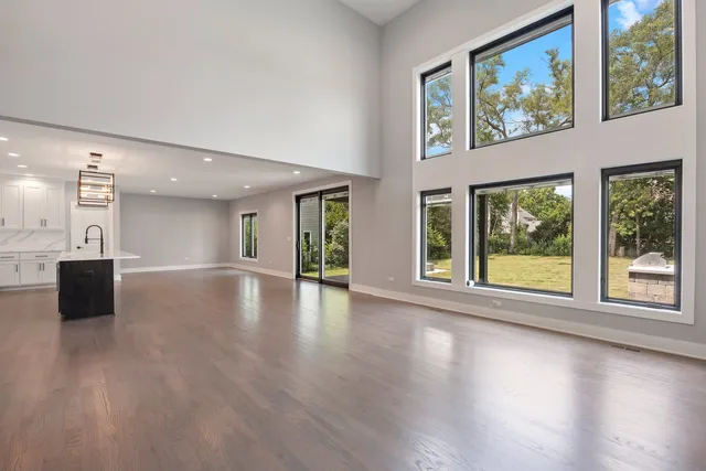 a view of a building stairs with wooden floor