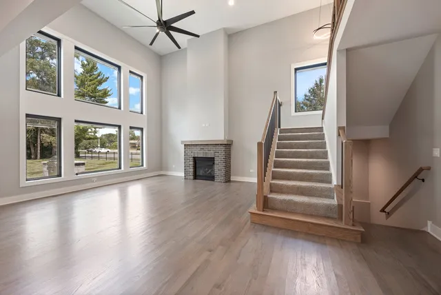 a view of an entryway with wooden floor and a window